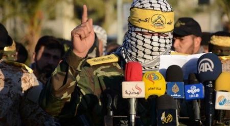 "التنظيم" يجدد دعمه لفتح وللرئيس عباس